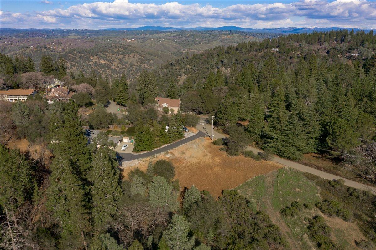 Ready to build, enjoy this 3 acres gem near Gold Hill a location just outside of town. That perfect distance to amenities you have been looking for. Close to World Class recreation. This property has a rough cut pad/clearing, Water and Electricity at site less than 500 feet. Useable land and Views with a Seasonal Creek. This property awaits your Home Build.