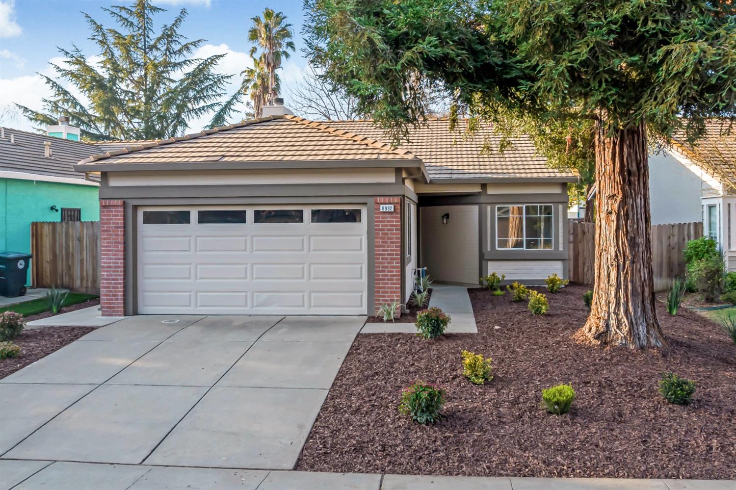 Charming Elk Grove home with great curb appeal. Fresh new landscaping invites you into the warm cozy