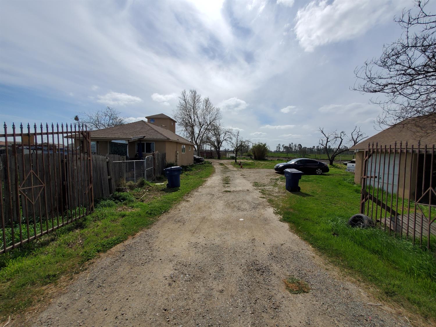 Build up to 6 single family homes or multi-family homes on this 0.79 acre lot that is zoned R-10.  There are currently four structures on the property.  There is one home, detached garage and three other structures on property.  Tenant is on month to month lease.