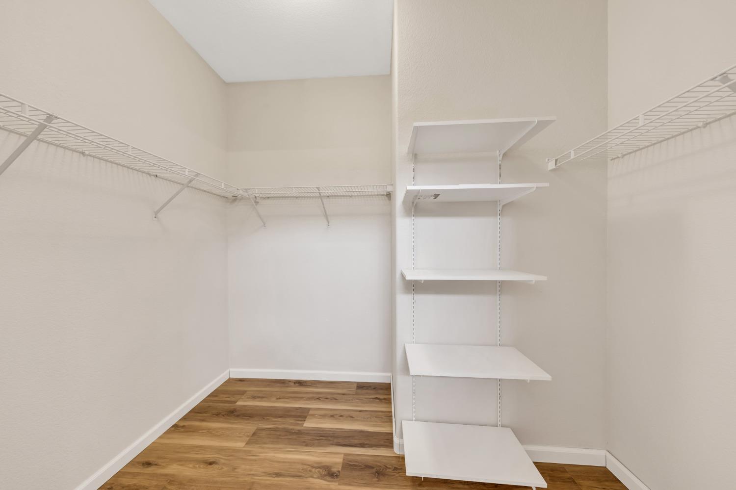 Very large closet with shelves in Master Bath