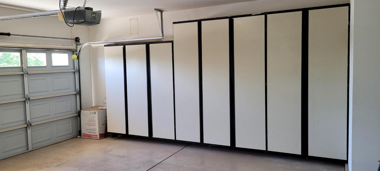 2 Car Garage with storage cabinets
