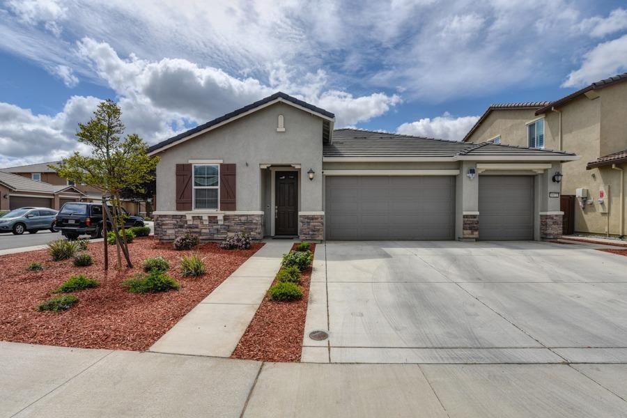 Hurry to this Beautiful Alexa Smart Solar Home before it's SOLD! Built in 2017 with 4 bedrooms, 3 full baths and 2,361 square feet of living space. This beautiful clean home offers a spacious open floor plan with nice inviting entry way, separate formal and family room areas as well a big kitchen island with breakfast bar and stainless steel sink. Stainless steel built-in oven & microwave along with a nice built-in gas range complimented by a white subway tile back splash and stainless steel hood. The master bathroom has double sinks, a big soaking tub plus a nice tile stall shower and walk-in closet.  Two of the bedrooms are connected via a Jack & Jill full bathroom with double sinks. Beautiful granite and cultured marbled countertops throughout the home, as well tile and carpet flooring throughout. Lots of cabinet and storage space with multiple drop zone cabinetry. Located on a corner lot, other amenities include a keyless front door entry, back patio area with fruit trees and more.