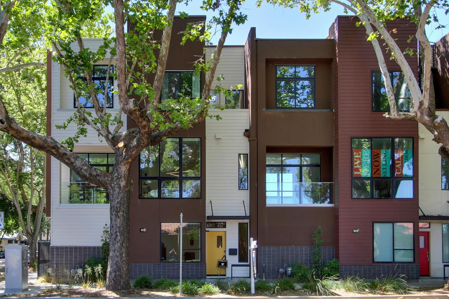 NO HOA FEES! 2020 single family townhouse in a prime downtown location at 5th & S Street. LUXE LIVING at its best featuring a "Treehouse" effect with walls of windows with views of Sacramento's beautiful tree lined streets. Stunning upscale on-trend finishes include a chef's kitchen with white granite waterfall counters and breakfast bar, gas range, stainless steel refrigerator, dishwasher and large walk-in pantry. The great room open concept floor plan has soaring ceilings and a private patio. Enjoy Abundant storage throughout the home and it's 3 bedrooms including a laundry closet upstairs. The LUXE Master Suite offers soothing treetop views and a spa inspired shower, double sinks and walk-in closet.The first level has direct access to the gated driveway for private access for just the 5 homes in the development for your oversized 1 car garage with an Electric Vehicle charging station.