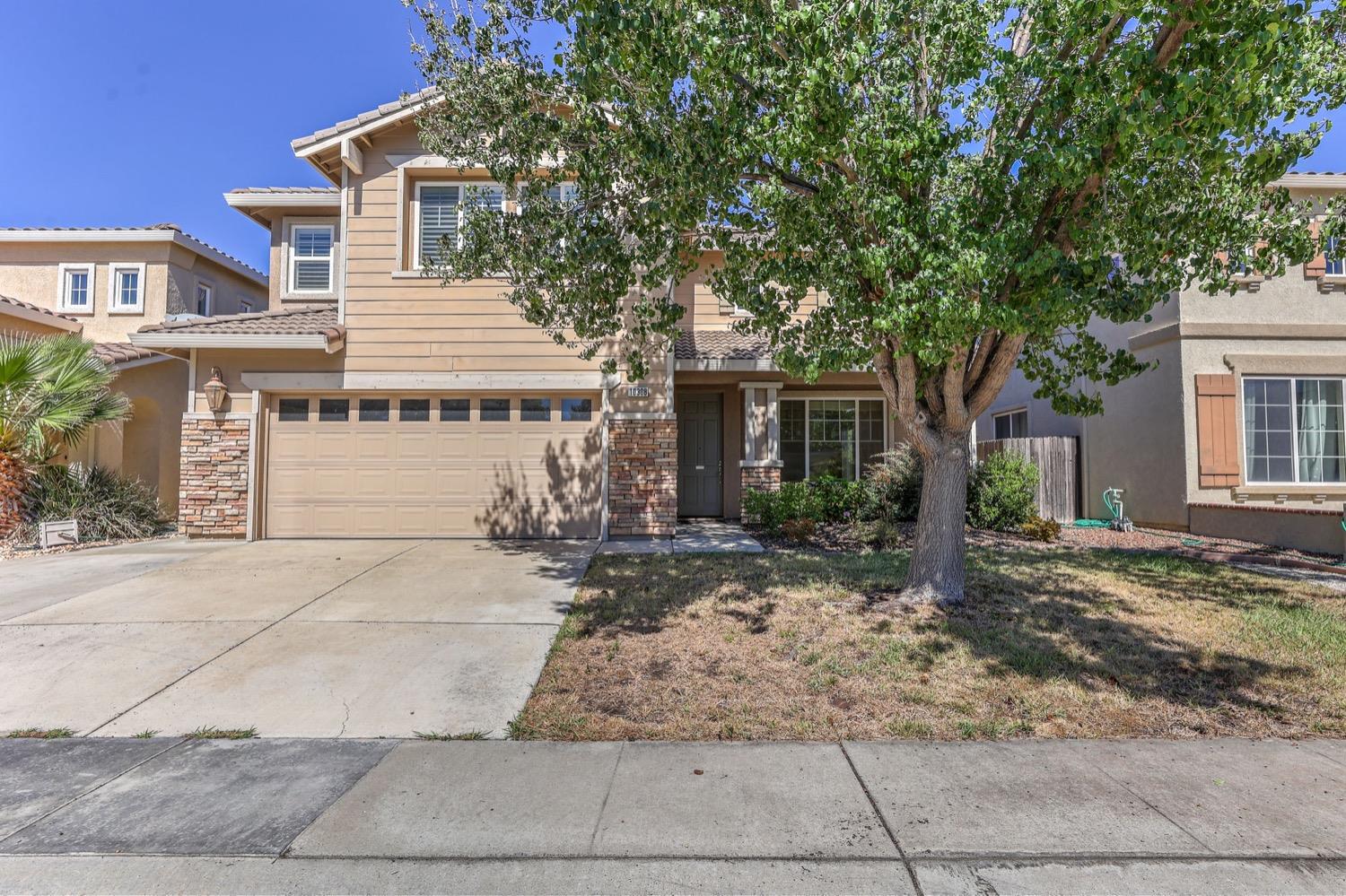 Location! Location! Location!  This beautiful Elk Grove home features 18 foot high cathedral ceiling