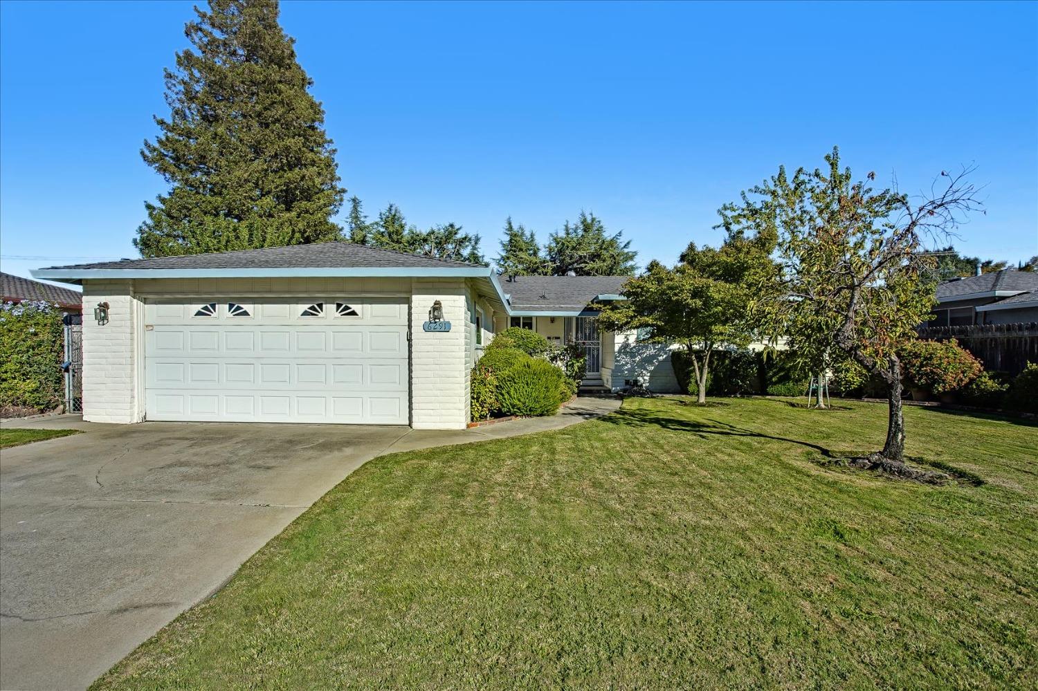 STOP the car for this one in a million 3BD/2BA home in the prestigious South Land Park Hills with 2-
