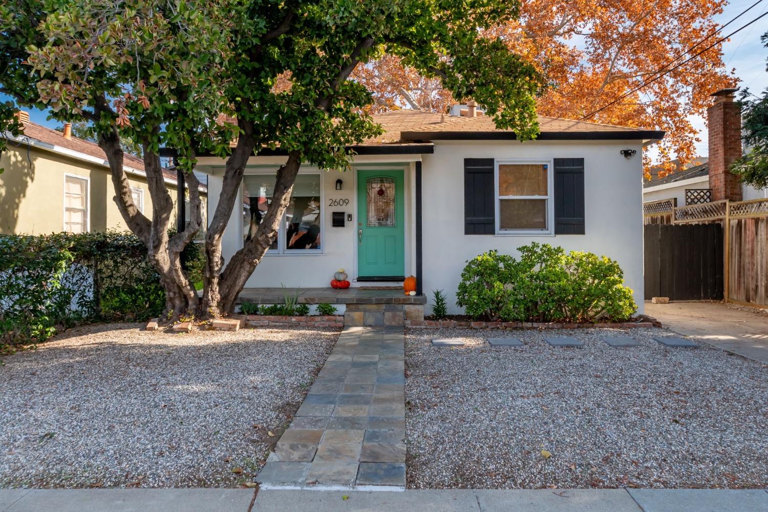 Charming 1930's Curtis Park bungalow on a beautiful tree-lined street in one of Sacramento's most de
