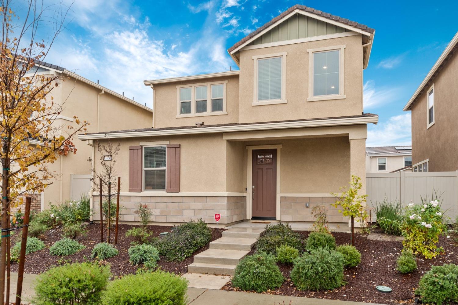 Built in 2019, this immaculate four-bedroom three-bathroom Natomas Meadows smart-home is centrally l