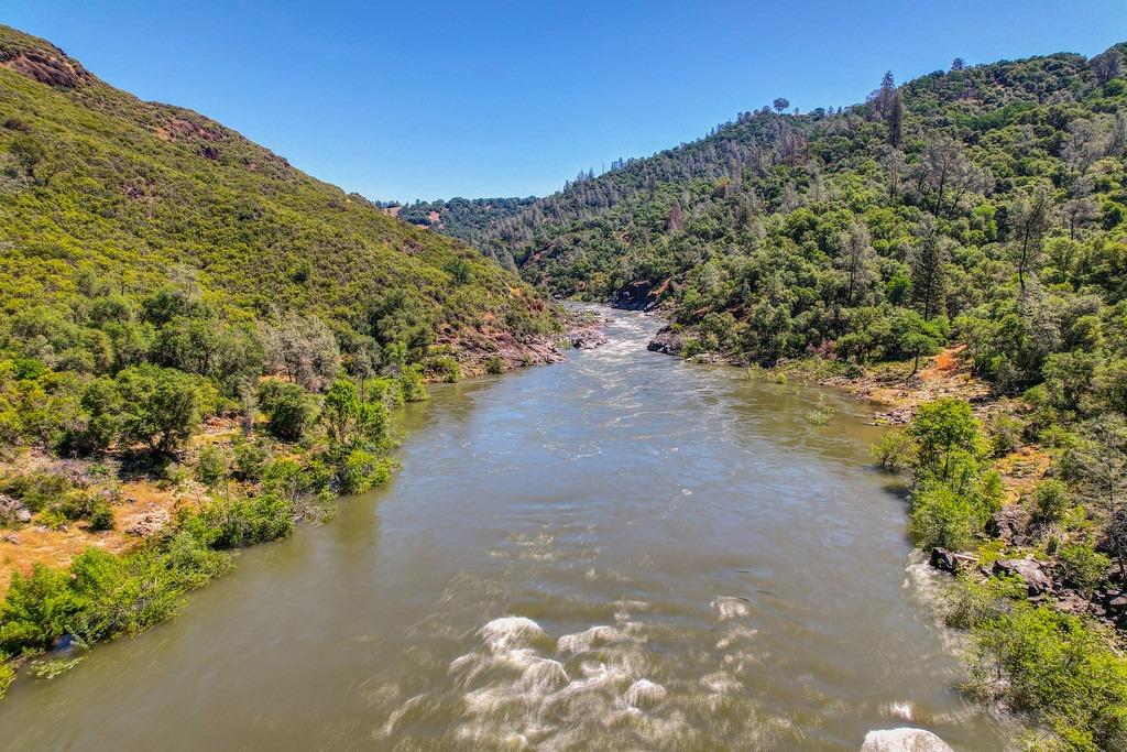 PRIVATE RIVER FRONTAGE!!! Once in a lifetime opportunity to own a piece of California's Gold Rush History. Family owned for over 100 years! Pan for gold, start your own vineyard, farm, or off grid homestead. Several great build sites, build close to the water or on the ridge with views of the river and surrounding landscape. This property has it all. Over 1000 feet of South Fork of the American River frontage, over 400 acres of bordering BLM land with no public access. Hunt, fish, riding/hiking trails. Perfect for the outdoor enthusiast. Enjoy peace and tranquility while being only a short drive from award winning wineries, world class whitewater rafting & kayaking, Marshall Gold Discovery State Park, Apple Hill, El Dorado Hills and Downtown Placerville.