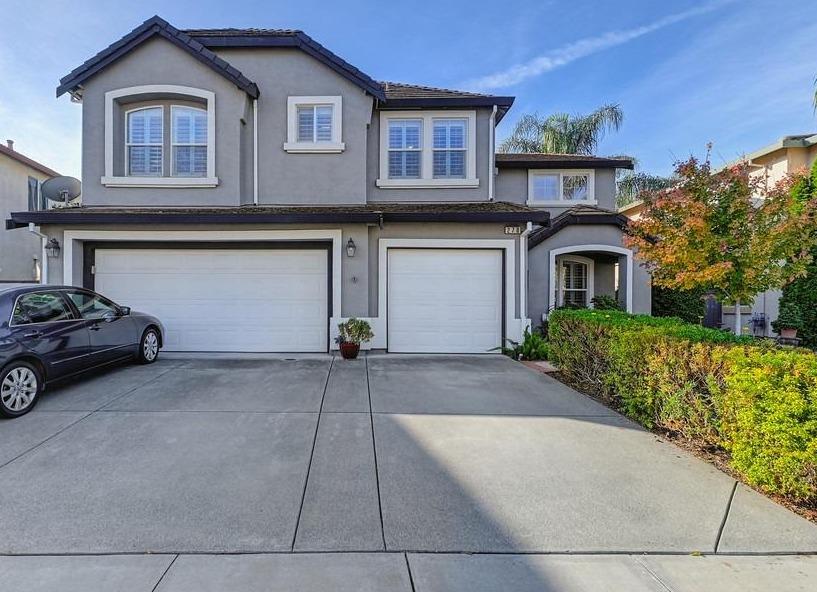 Immaculate 4 bedroom 3 bath home located in Natomas Park complete with a built-in pool-spa and outdo