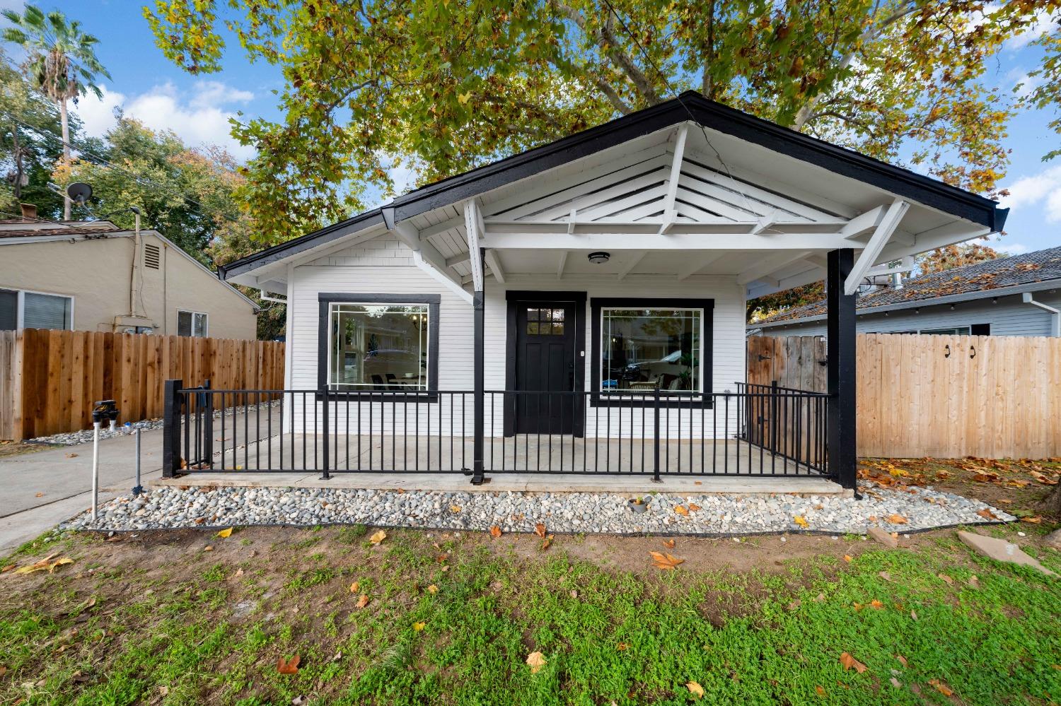 Welcome to this charming Curtis Park bungalow, this cozy cottage-style home offers the perfect blend