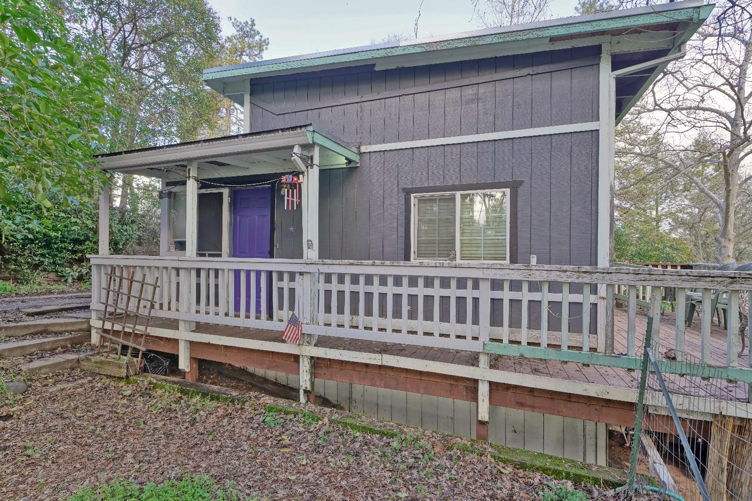 COUNTRY COTTAGE IN PLACERVILLE. Located within walking distance to local in town shopping/services and activities. This quaint cottage is located in a setting that allows for gardening and still separate it from town.  Lots of potential, this 3 bedroom, two bath home is the ideal retreat.