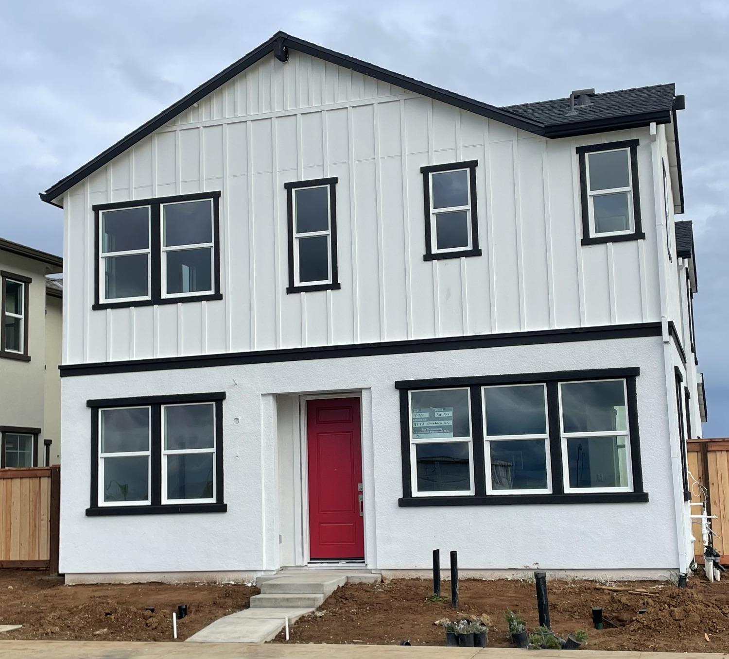 New built construction by Woodside Homes. Three bedrooms, three full bathrooms, one bedroom on main 