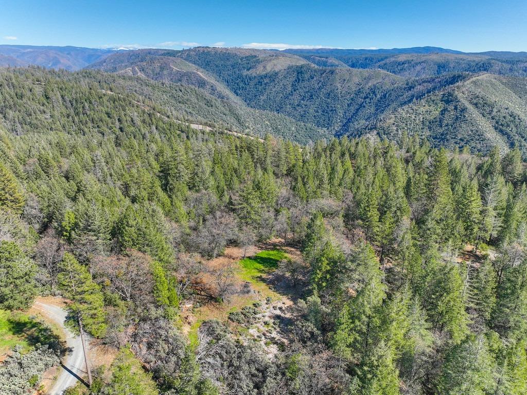 Rare find for this 20.5 acres with Panoramic View of the Snow Capped Mountains, Middle Fork of the American River Canyon and Ridges and City Lights! Over see the Tahoe National Forest and walkin distant to BLM land. Access to the Tevis Trail for horse back riding. Property access is at the very end of Oakwood Lane, Power, phone and FHPUD at street. Might also be able to do a well. Great for a Solar site with a Southern Exposure. Several building sites. Property lays along a long ridge.