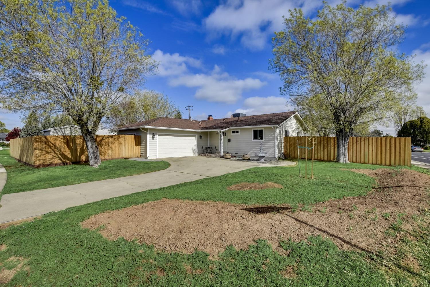 Rancho Cordova dream home! Nestled on a spacious quarter-acre corner lot, this stunning property boa