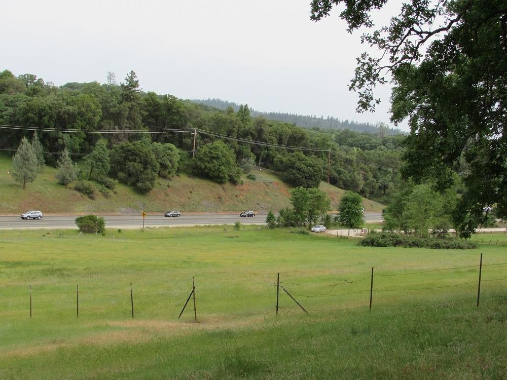 Very usable 12 PLUS acres on Grass Valley Highway. Close to Streeter Road with highway access, per the seller. Top of the property is the NID canal.