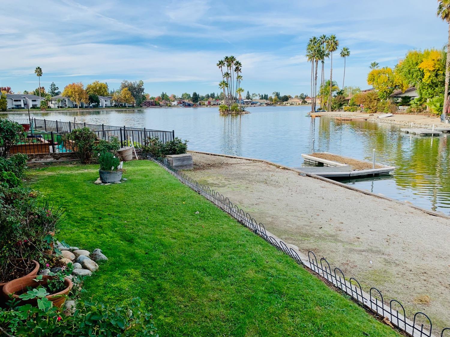 Great Opportunity to own a lakefront home. This modernly updated home is situated on Greenhaven Lake