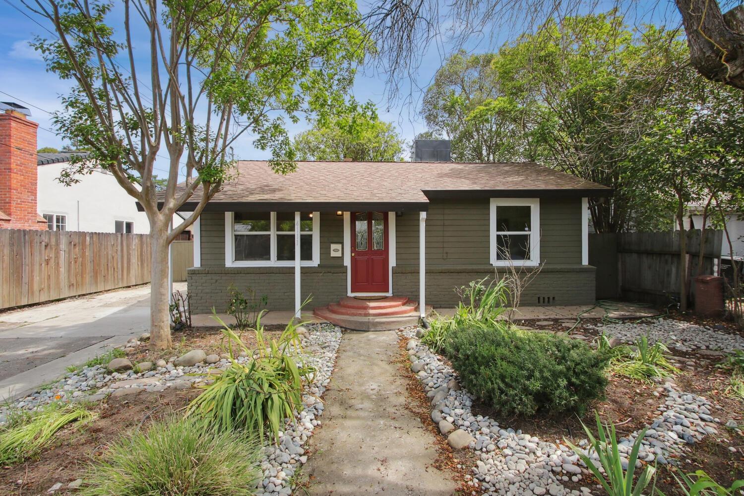 Welcome home to a charming cottage in the heart of Sacramento's North City Farms neighborhood. This 