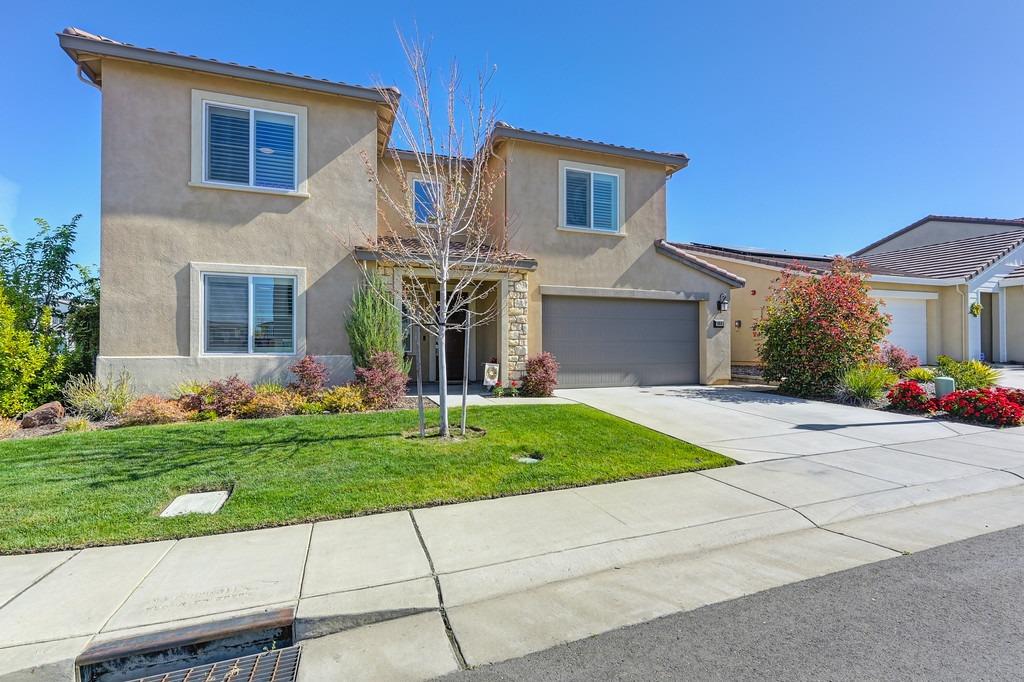 Welcome to this beautiful like new home with an open floorplan that features four bedrooms, 3 full b