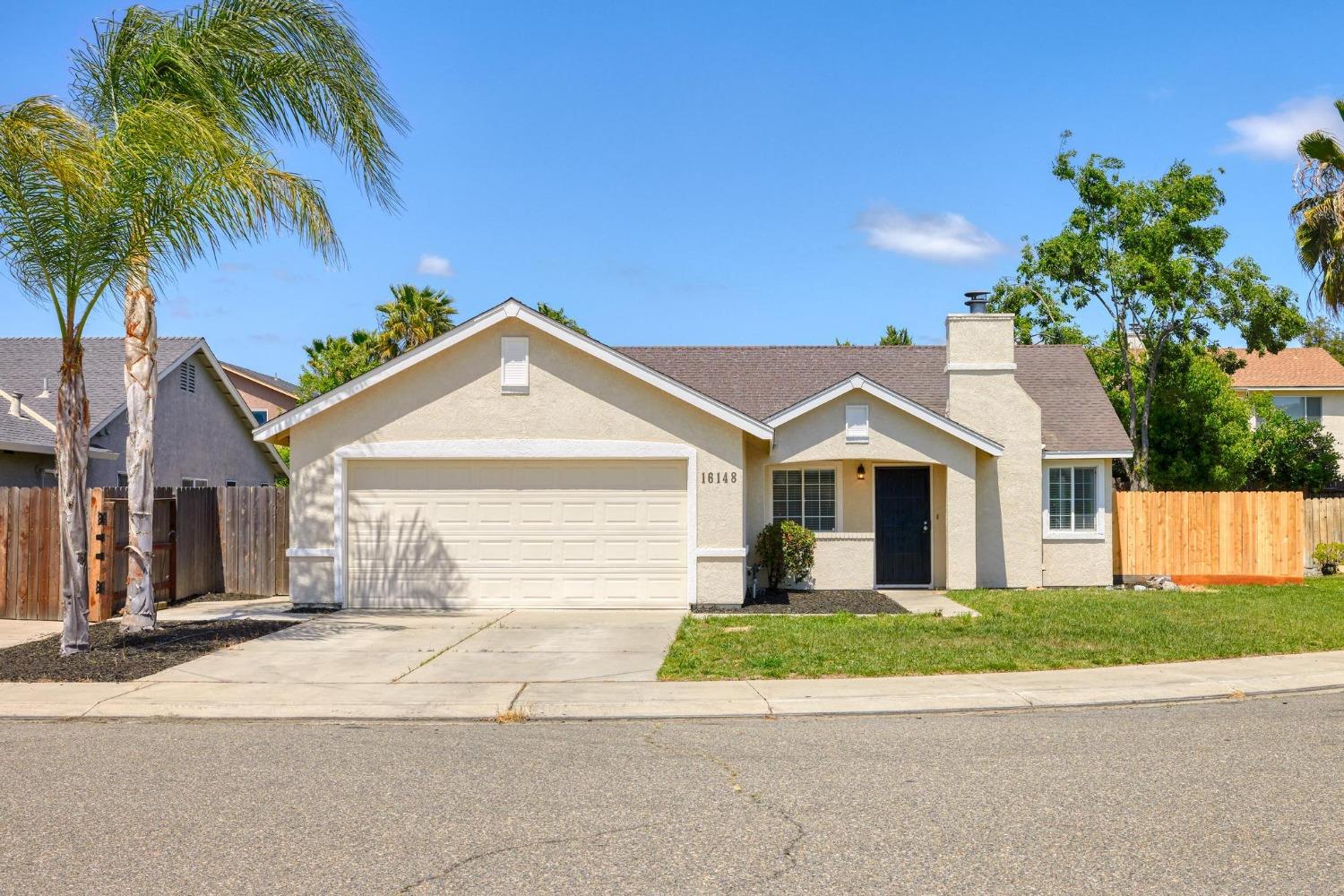 Welcome to tranquil living at 16148 Summit Ct. Nestled in a cul-de-sac, this 3-bed, 2-bath home offe