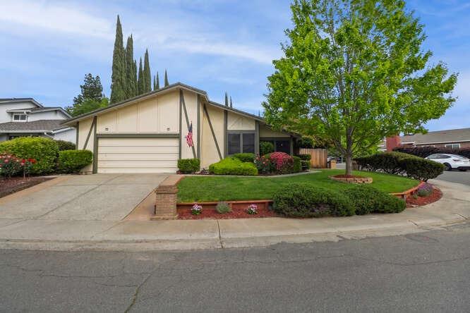 Nestled in the heart of Orangevale, this charming home boasts a beautifully manicured corner lot.  F