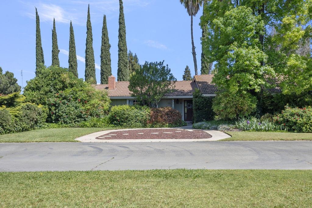 Nestled on a sprawling lot in the highly coveted neighborhood of McSwain, this enchanting 4-bedroom,