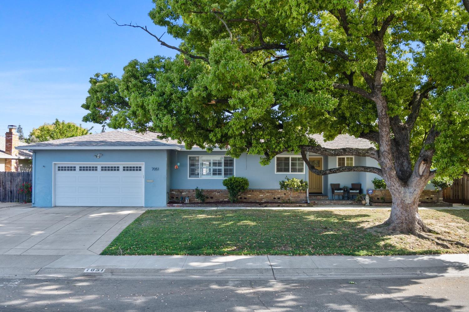 7051 Maita Circle Sacramento, California Welcome to 7051 Maita Circle, a beautifully designed 3-bedroom, 2-bath, 1481 sq ft main home with a fully equipped 350+ sqft guest house located just East of Tahoe Park in a quiet and well established neighborhoods Inside, the main home offers a smart and functional layout with an open kitchen, dining concept, and living area that makes daily life and entertaining effortless. Quartz countertops and generous cabinetry provide plenty of prep and storage space, while updated windows and clean finishes add to the home's fresh, modern feel. Out back, a covered patio with ceiling fans and brick pathways create a great space to host, relax, or enjoy outdoor dining. A pass through garage door that opens directly to the backyard adds a unique touch, perfect for flexible use of the indoor-outdoor space. The additional guest home (built by the original owners) includes a large common space with separate area for a home office or outdoor entertaining and offers a full bath, and kitchenette. This space is ideal for hosting family gatherings, or to accommodate guests or extended family, or generate potential rental income if converted into a full ADU. With easy access to Highway 50, UC Davis Med Center, and Midtown, this home offers a rare combination of comfort, flexibility, and location.