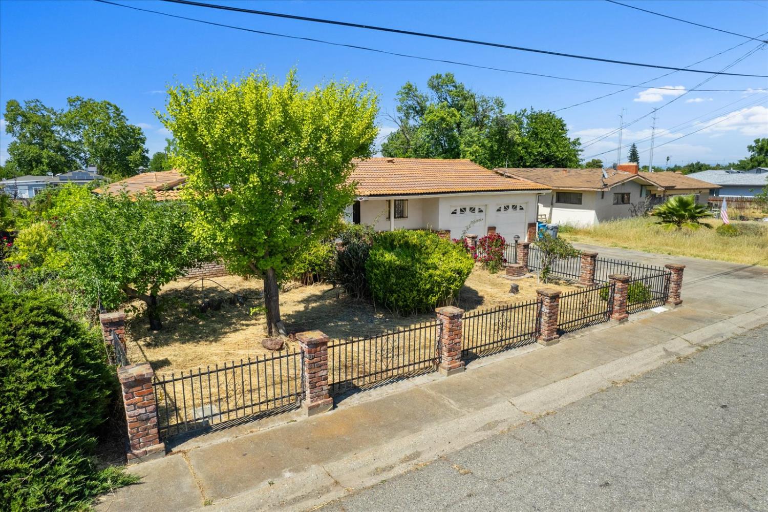 1961 17th Street Olivehurst, California Opportunity awaits with this spacious property full of potential! Featuring a unique layout with two kitchen areas, this home is ready for someone with a creative eye to reimagine and restore. The interior offers great bones and room to customize to your style. Outside, the massive backyard provides endless possibilities-- add a garden, build an outdoor entertaining space, or explore expansion options. With a little work, this could become the home of your dreams or a standout investment in a well-established neighborhood.