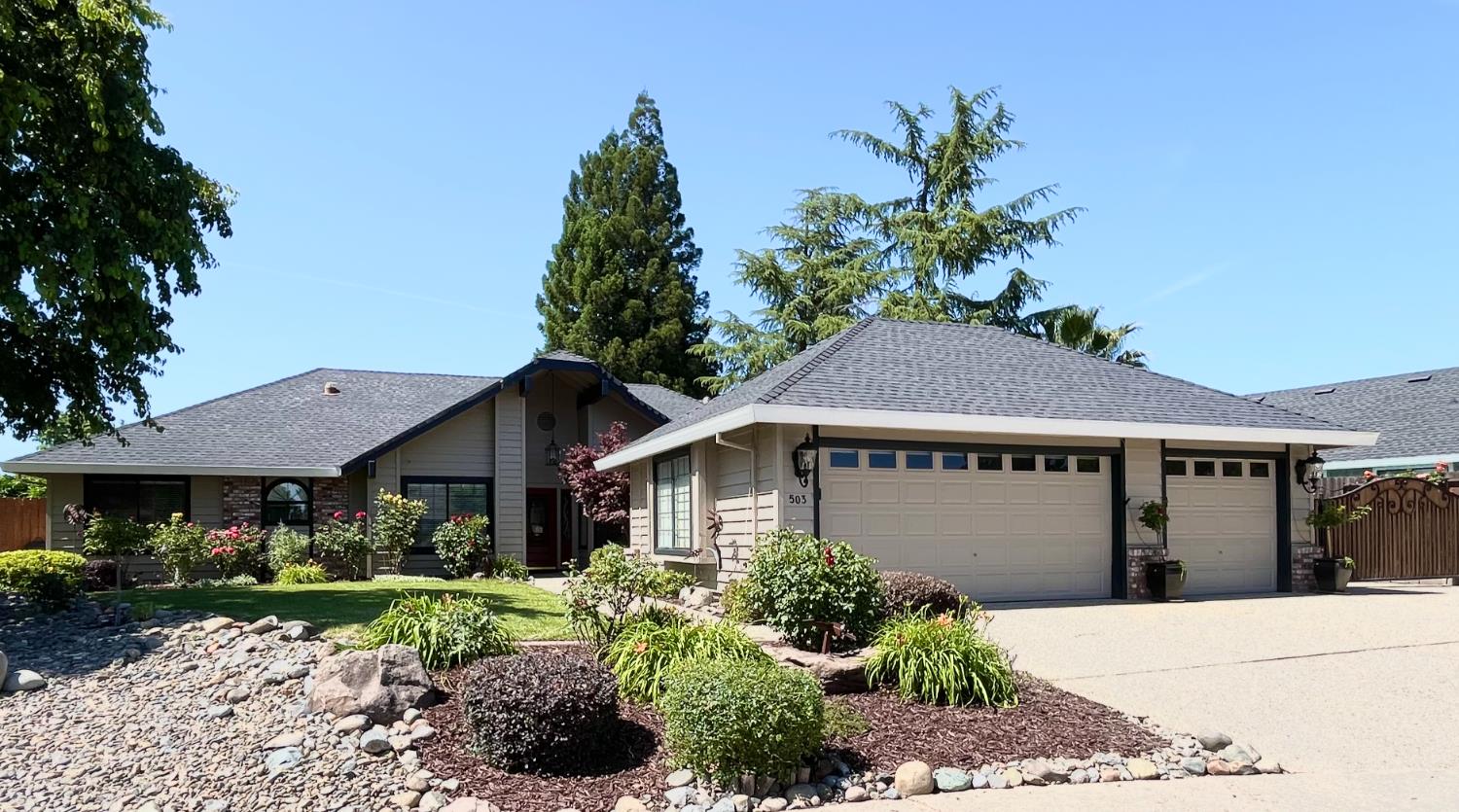 503 Hogan Court Roseville, California GORGEOUS Semi-Custom Beauty in Roseville's coveted Diamond Oaks Neighborhood! This extraordinary single story home boasts a traditional floor plan featuring 4 Bedrooms & 3 Full Baths with approx 2,362 sq ft of inviting living space. Kitchen has granite tiled counters, breakfast nook area and charming French door leading to enclosed sunroom. Living Room has vaulted ceilings, wood mantle and tiled hearth connected by double-sided fireplace to open family room with coffered ceiling and floor to ceiling brick hearth. Master Suite has a newly remodeled attached bath in Nov 2024 with custom tiled walk-in shower, double sink vanity and walk-in closet. Private separate wing with full bedroom and bath is potential in-law quarter setup. Wood-grain laminate plank flooring throughout home, newer HVAC and whole house fan. Family Room, Living Room and Master Bedroom all have large sliding glass door access opening out to the backyard with mature landscaping and rear covered patio cover with ceiling fans perfect for enjoying a summer BBQ. Gated RV Access with expansive driveway can accommodate a RV/Trailer or Boat with No HOA and 3-Car Garage. Nestled in a lovely cul-de-sac with a prime location close to schools, parks, Diamond Oaks Golf Course, The Fountains & Galleria Mall. This is the ONE!