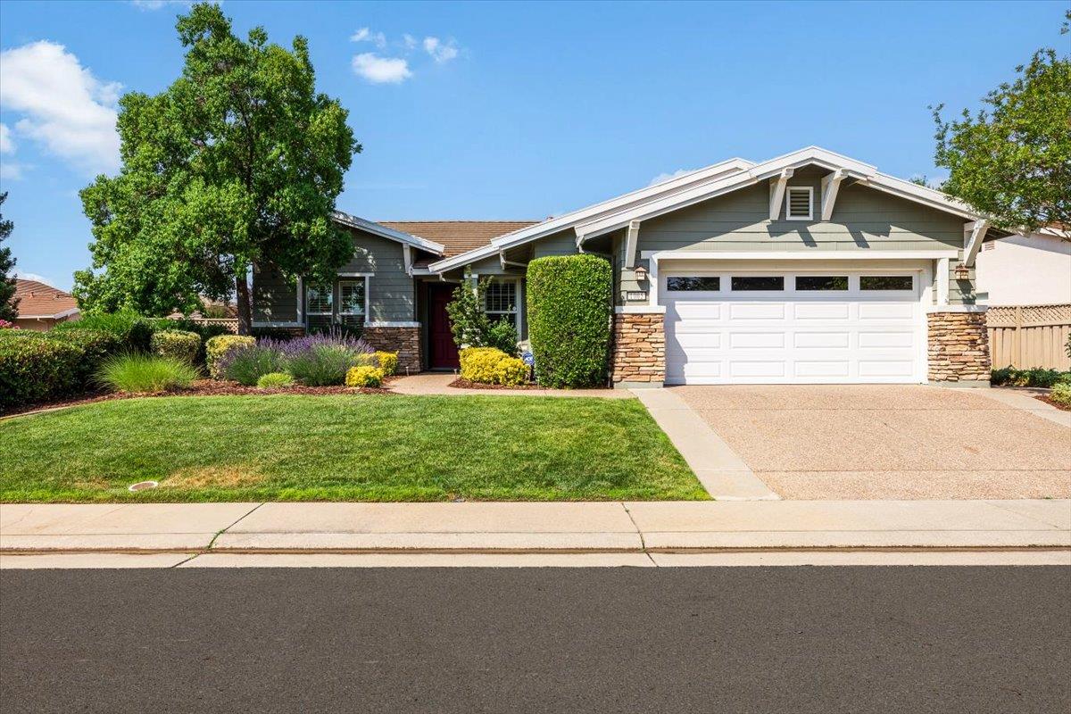 1005 Longhorn Lane Lincoln, California You'll love this pretty 'El Dorado'! Very near Kilaga Lodge and has easy access to shopping and services. Popular open great room plan with a generously sized den. Beautiful wood flooring and upgraded cabinets. Fireplace and shutters. Granite counters and stainless steel appliances. Front facing kitchen nook with large pantry. Primary suite has bay window as well as a large walk in closet. Primary bath has large shower with separate tub. Inside laundry with washer/dryer and cabinets. Expanded two car garage. Beautiful mature landscape front and back. Large covered rear patio. Move in condition- don't miss the attached video of this wonderful home!